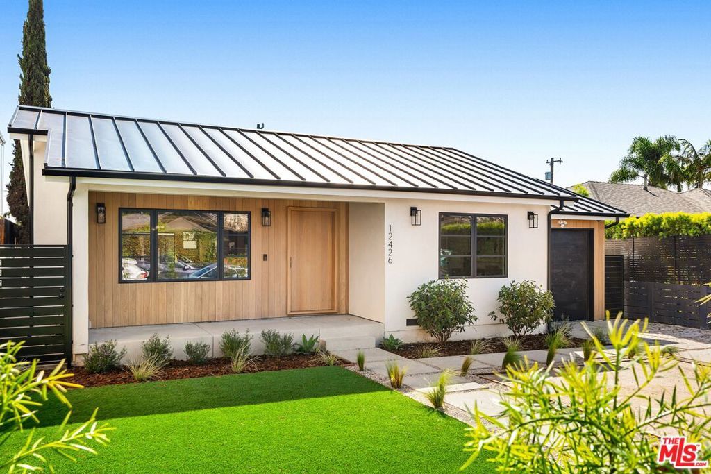 Photo of 12426 Woodgreen Street, Los Angeles, CA 90066 (MLS # 26650909)