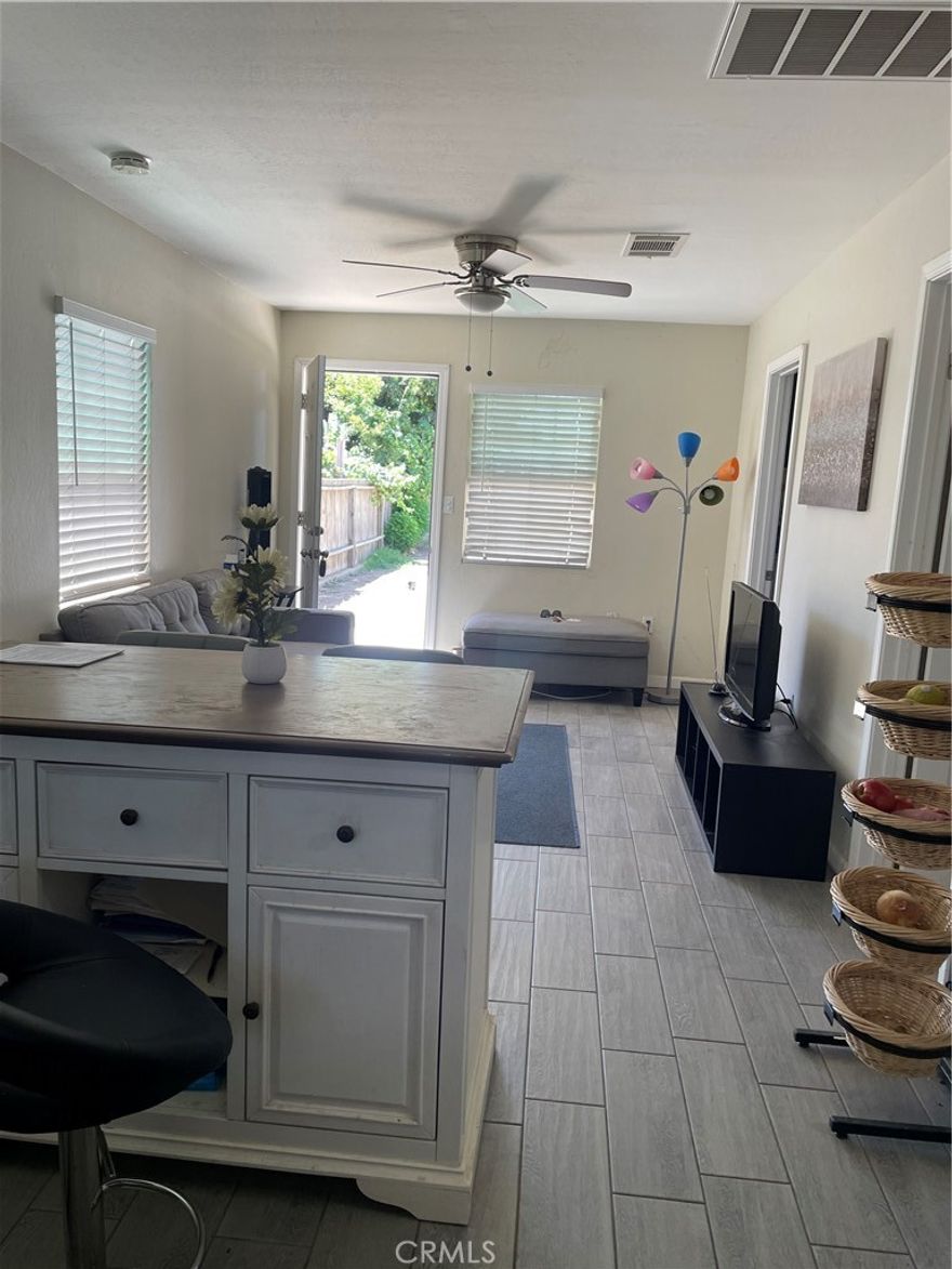 Welcome to this cute and cozy beautiful updated home with a huge front driveway. 2 bedroom, 1 bathroom. Newer kitchen with granite counter tops, and mosaic tile back splash, updated flooring throughout, remodeled bathroom. Central air conditioner and heating.The spacious backyard has potential for an addition or an ADU, RV-boat parking. Close to the Airport. Easy access to the freeway