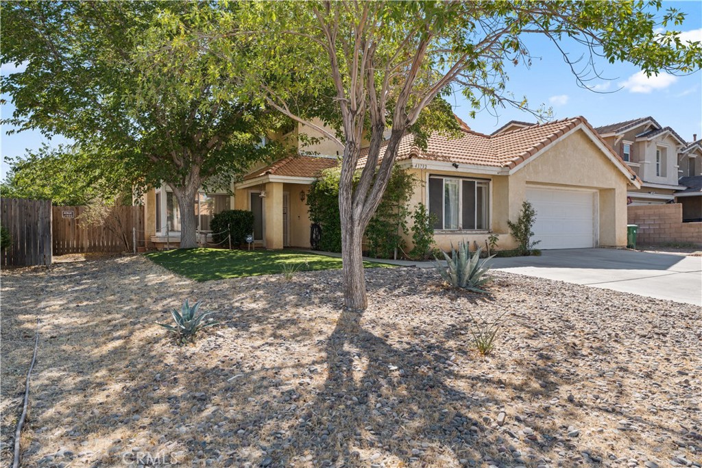 RARE OPPORTUNITY TO OWN A BEAUTIFULLY DESIGNED 5 BEDROOM 4 BATHROOM HOME!!! This home blends comfort and functionality with lots of space. With two master suites, including one conveniently located downstairs with a handicap-friendly bathroom, the floor plan is ideal for large families or those who wish to share their home with parents, loved ones or a room mate.
This home features a spacious kitchen with granite countertops, plenty of cabinetry, and a charming breakfast nook with lots of natural light. Just steps away, the family room offers a cozy fireplace—currently covered for child safety, but fully functional—perfect for gathering on cooler evenings. Newer flooring is throughout the downstairs, adding a fresh touch to the home's inviting character.
With two bedrooms and two bathrooms downstairs, plus three more bedrooms and two full bathrooms upstairs, there is ample space for everyone. Don't worry about high electric bill because this home has a fantastic Solar Power Purchase Plan!! Outdoors, low-maintenance turf in both the front and back keeps the yard looking pristine year-round. There is a storage shed in the backyard offering extra space for tools, hobbies, or seasonal items. And YES
This home is perfect for large families or a family just starting out. Whether you're hosting family, caring for loved ones, or simply looking for a place that can grow with you, this property is ready to welcome you home.