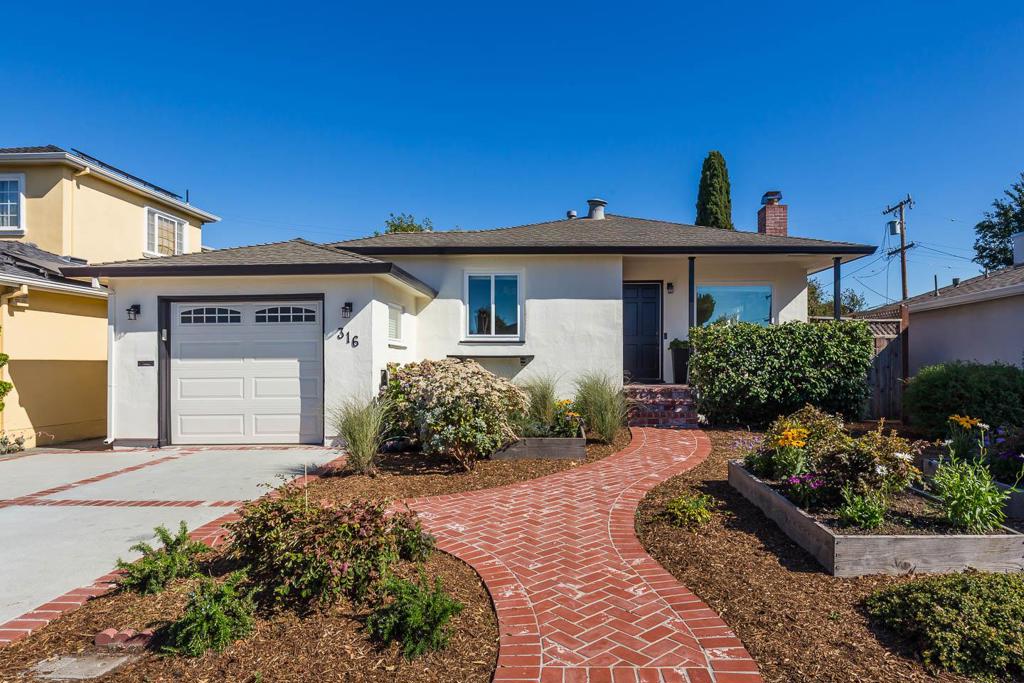 Picture-perfect and thoughtfully updated, this home is ideal for starting out or downsizing with its convenient location in highly desirable San Mateo Village with excellent schools, shopping, and dining all a stones throw away. Its timeless charm is freshly updated for modern livability. New paint inside and out along with beautiful hardwood floors, crown moldings, recessed lighting, and horizontal slatted window blinds in every room. The spacious living room has a fireplace and the dining area is defined by a 5-light chandelier and breakfast bar seating in the kitchen. The remodeled kitchen features painted cabinetry in a light hue, light granite countertops, subway tile backsplashes with glass mosaic feature strip, and stainless steel appliances, including a gas range. Two bedrooms have great custom closet organizers, and the updated bath features beadboard wainscot, a pedestal sink, and a glass-enclosed tub with overhead shower. The rear yard is expansive with patios, lawn, and perimeter landscaping. The low-maintenance front yard has raised beds for flowers or vegetables, a brick walkway, and inviting covered porch. Minutes to Hillsdale Shopping Center, Bay Meadows, Caltrain, Whole Foods, Trader Joes, and parks as well as Highway 101 to Silicon Valley and San Francisco.