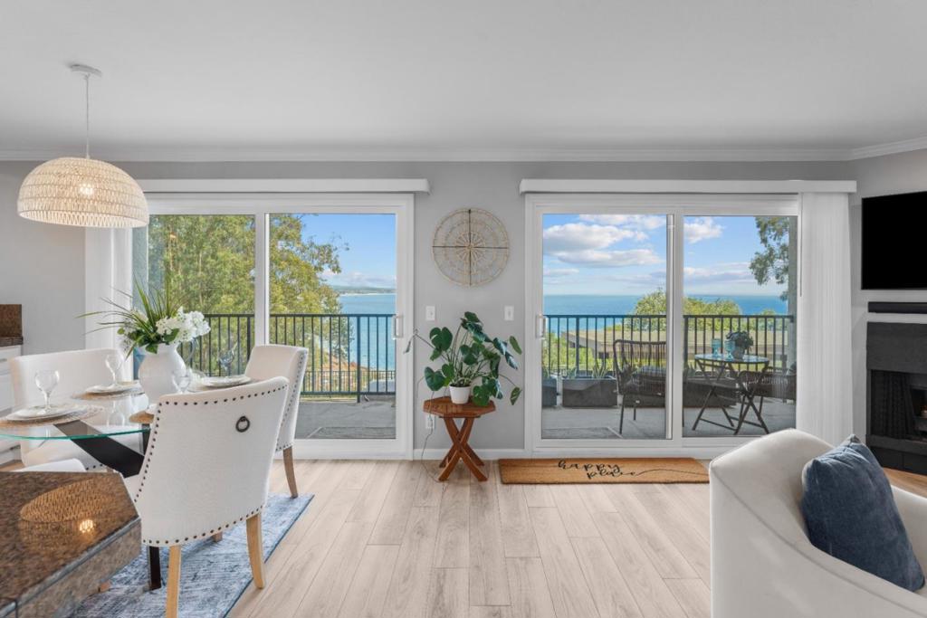 Welcome to 870 Park Ave. #110, where you will be greeted every day with spectacular head-on ocean views of the beautiful Monterey Bay. Located in the private and secure community of Park Avenue by the Sea, this single level 2BR/2BA condominium home has it all: an incredible location, incredible views, an incredible layout, and offers an incredible lifestyle. Enjoy morning coffee or evening libations from your full-length balcony overlooking the bay, stroll into downtown Capitola or Gayles Bakery, walk for miles along New Brighton State Beach, or cozy up in front of your fireplace with a good book. Remodeled with newer floors, an open-concept kitchen with induction cooktop, newer paint, some newer appliances, and some updated fixtures, this one is a stunner. Always wanted to live that beach lifestyle? Now you can, with this low-maintenance and cost effective condominium home. Complex includes a heated pool and spa, sauna, a nicely outfitted gym, common grassy yard, and an elevator. One covered parking space and a huge walk-in storage closet for all your beach toys round out this ocean view beauty.