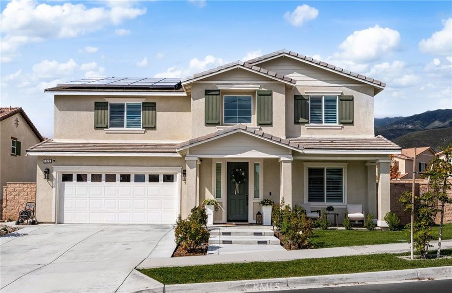 Don’t miss this exceptional opportunity to own a corner-lot pool home in the prestigious Mountain View gated community of Fontana. This beautifully appointed two-level residence offers 5 spacious bedrooms and 3 bathrooms, thoughtfully designed for both comfort and sophistication. The open-concept floor plan highlights a modern kitchen with quartz countertops, stainless steel appliances, and ample storage, seamlessly connecting to the living and dining areas. Additional features include energy-efficient solar panels and a tandem garage providing extra space for parking or storage. Step outside to a private backyard retreat complete with a sparkling pool, ideal for outdoor entertaining. Situated in a quiet, secure neighborhood near parks, schools, and shopping, this move-in ready home perfectly blends elegance, function, and modern living.