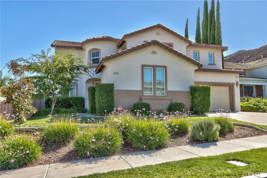 Welcome to this beautiful 5-bedroom, 3 full-bath home tucked away on a quiet cul-de-sac in the gorgeous Canyon Hills community. Sitting on a large lot with low-maintenance, drought-friendly landscaping, this home offers plenty of space inside and out for the whole family to enjoy.

Step inside to find warm wood flooring, stylish tile, and charming plantation shutters throughout. The open kitchen features stainless steel appliances, granite countertops, and flows easily into the living and dining areas—perfect for family dinners and get-togethers.

Upstairs, you’ll find a spacious loft that’s great for a playroom, media space, or home office. The large backyard is made for fun and entertaining, complete with a wood-burning pizza oven that everyone will love.

You’ll also enjoy a 3-car garage, low taxes, and a welcoming community that offers pools, sports parks, a splash pad, and dog parks.

With plenty of room to grow and community amenities for everyone, this home is the perfect place to make lasting family memories!