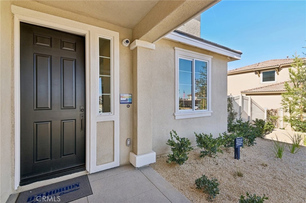 NEW CONSTRUCTION - SINGLE-FAMILY HOMES - Welcome to The Reserve at Quartz Hill, a stunning new-home community in Palmdale, featuring one and two-story homes ranging from 2,488 to 3,015 sq. ft. and with up to 5 bedrooms, 3 bathrooms. This 5 bedroom + Loft + 3 bath, 3,015 square foot home HAS IT ALL – welcoming covered porch and beautiful entry, a main level bedroom and full bath, large den, open floor plan, expansive Great Room, Kitchen and Dining Space designed for gathering and entertaining. The Gourmet Kitchen includes Quartz countertops, Stainless Steel appliances, beautiful kitchen island and large, walk-in pantry. Head upstairs to the large Loft great for lounging, studying or movie nights. There are three additional large Bedrooms and Bathroom with dual sinks and an expansive Primary Bedroom and Primary Bath with Large Walk-in Shower and extra-large Primary Walk-in Closet. The generous back yard space provides a blank canvas for the ultimate outdoor oasis and the large 3-car garage provides plenty of space and storage. Other amazing features include Smart Home Technology with home automation features at your fingertips.