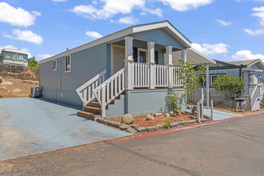Welcome to Your Perfect Starter Home in a Peaceful Community! Discover this charming 2020-built manufactured home nestled in the quiet, friendly community of Westward Ho Manor. Located in the heart of El Cajon, Space 103 is an end unit offering added privacy and convenience with double parking areas—perfect for an RV, recreational toys, or multiple vehicles. Step inside to a spacious, modern interior with an open floor plan, designed for comfort and functionality. Whether you're relaxing in the bright living area or preparing meals in the well-appointed kitchen, you'll feel right at home in this well-maintained space. The community offers a host of amenities, including a sparkling swimming pool, clubhouse, and well-maintained grounds. Enjoy being just minutes away from major shopping centers, grocery stores, restaurants, and schools—all while coming home to a peaceful, tucked-away location. With ample guest parking, a welcoming neighborhood vibe, and easy access to Hwy 67 and I-8, this property is a rare gem for first-time buyers or anyone looking to downsize without compromising their lifestyle. ?? 12044 Royal Rd, #103 – Where comfort, convenience, and community come together.