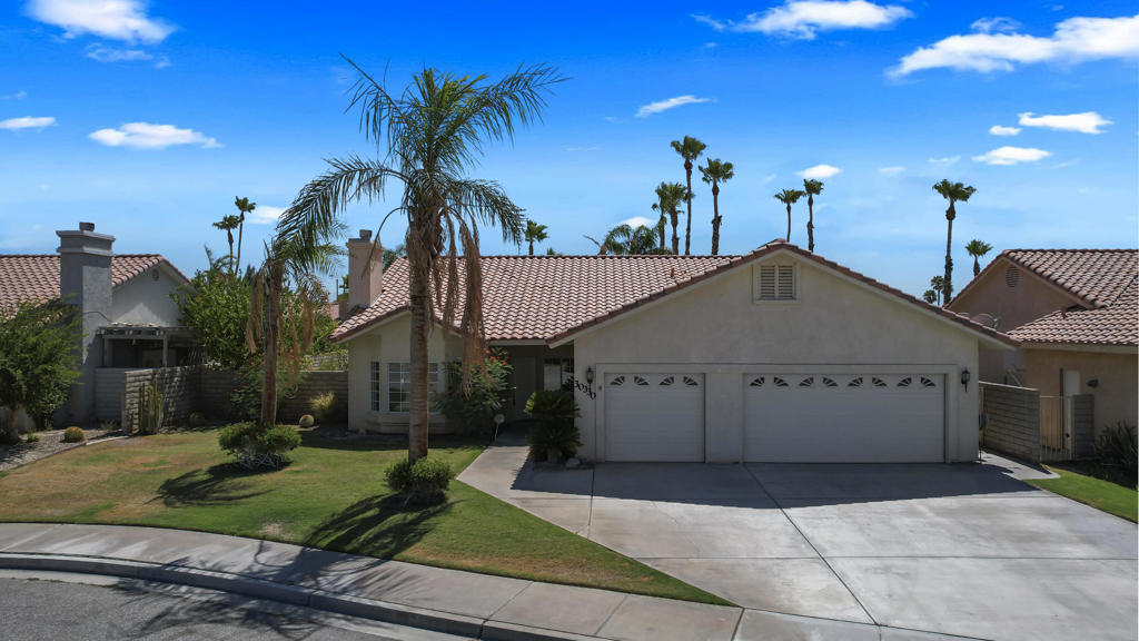 Welcome to this newly remodeled home in the highly desirable Landau Manor neighborhood in Cathedral City!This beautifully updated 3 bedroom, 2 bath home sits on a nearly 1/4 acre lot at the end of a quiet cul-de-sac with a sought after three car garage featuring a huge attic for storage.The interior is freshly painted a crisp white including the tall vaulted ceilings, baseboards and doors with black lever handles. Brand new light colored luxury vinyl plank flooring has been installed throughout, adding to the airy, modern feel.The gas fireplace in the large living area has been upgraded with modern matte gray tile that extends all the way to the vaulted ceiling, creating a striking focal point. Stylish chandeliers and ceiling fans have been installed in every room with energy efficient LED lighting throughout.The kitchen features glossy white cabinets and sleek granite countertops. It showcases all new Maytag stainless steel appliances including a gas range, built-in microwave and dishwasher. A new single bowl stainless sink, industrial faucet and new garbage disposal complete the large kitchen island.Both bathrooms have been completely remodeled and have never been used. The primary bath has luxurious porcelain tile incorporated in a wet room style design with an oversized walk in shower, spa like freestanding tub, new walnut vanity with double sinks and contemporary gold fixtures.The second bathroom features penny tile flooring, all new fixtures including bathtub, surround, vanity, sink, mirror and toilet with modern black plumbing fixtures. This home has not been lived in since remodel, be the first,! Take a tour today. EASY TO SHOW!