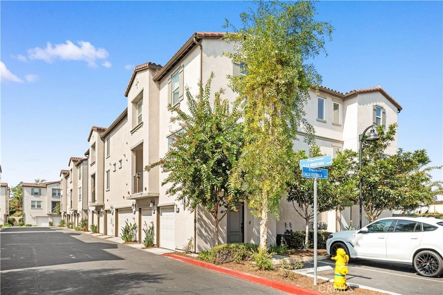 Welcome to Montecito Walk, one of Montebello’s most desirable and newer communities! Built in 2015, this beautifully upgraded 3-bedroom, 2.5-bath townhome offers approximately 1,380 sq.ft. of modern, light-filled living space that perfectly combines comfort, convenience, and style. Step inside and you’ll immediately feel at home — the open-concept floor plan features beautiful hardwood flooring throughout, a bright and spacious living area, and large windows that bring in abundant natural light. The modern kitchen showcases sleek stainless steel appliances, elegant granite countertops, and plenty of upgraded cabinetry, making it a true chef’s delight. Upstairs, you’ll find three generously sized bedrooms, including a primary suite with a walk-in closet and private ensuite bath. Every detail of this home has been thoughtfully designed to create a warm, inviting atmosphere. Enjoy the convenience of an attached 2-car garage equipped with a 220V EV charging outlet, in-unit laundry, central A/C and heating, and energy-efficient features throughout. The gated Montecito Walk community offers controlled access, 24-hour availability, and beautifully maintained common areas. Ideally located near Montebello’s city center, this home provides quick access to local shopping, dining, schools, and major freeways including the 60 and 605, making your commute a breeze. Move-in ready and full of upgrades — this home truly has it all! Whether you’re a first-time buyer, a growing family, or looking for a stylish and convenient home near Los Angeles, Montecito Walk is the perfect place to call home.
