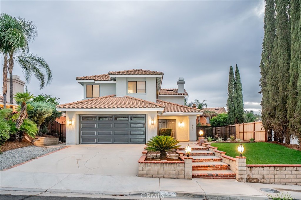*LOCATION*LOCATION* Welcome to 567 Eaton Street in desirable Corona neighborhood just waiting for you to call home. Charming curb appeal welcomes you inside to your formal living room featuring double sided tile fireplace offering ambiance to your living room and dining space. A second living area/family room is just around the corner and opens to your well appointed kitchen featuring NEW counter tops, NEW stainless steel appliances, and featuring large windows with views to your beautiful outdoor space. Upstairs you will find 4 bedrooms including a large primary suite with private balcony and ensuite primary bathroom featuring dual vanities, large soaking tub and walk in shower. Secondary bedrooms are generously sized with another full bathroom upstairs. The beauty of this home only gets better as you step outside into your peaceful backyard featuring large patio and plenty of grassy area to spread out, relax, and entertain. With NEW paint, NEW carpet, and NEW vinyl plank flooring this home is in turn key condition and ready to move right in! Great location close to many dining options, schools, shopping, and easy freeway access. This home is truly a GEM you don't want to miss!