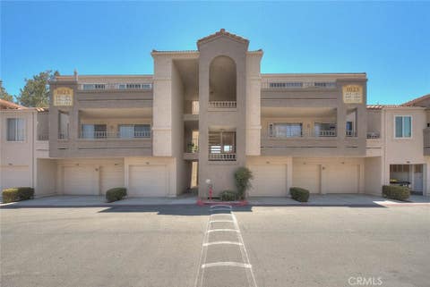 Photo of 1023 Vista Del Cerro DR #302, Corona, CA 92879 (MLS # CV26137625)
