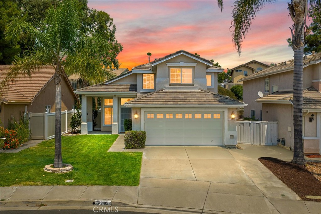 Welcome to Paloma Del Sol, one of Temecula’s most desirable and well-established communities. This charming 3-bedroom, 2.5-bath home offers 1,539 square feet of thoughtfully designed living space, perfect for a variety of lifestyles—from young families to empty nesters looking for a vibrant, active neighborhood. Step inside to updated luxury vinyl plank flooring throughout the downstairs, adding both style and durability to your main living areas. The living room features soaring vaulted ceilings that create a bright, open atmosphere filled with natural light. The kitchen offers granite countertops and connects seamlessly to the dining area, making it ideal for both everyday meals and weekend gatherings. Upstairs, the primary bedroom offers a private retreat. You'll love the expansive mirrored walk-in closet, dual sink vanity, and a shower-tub combo—providing both comfort and convenience. Paloma Del Sol is known for its scenic walking trails, mature trees, and a strong sense of community. With over 100 acres of parks and greenbelts, five swimming pools, tennis and basketball courts, tot lots, and even a 9-hole disc golf course, there’s something for everyone to enjoy—whether you're raising kids, staying active, or simply soaking in the peaceful surroundings. You’ll also enjoy close proximity to award-winning schools, shopping, dining, and freeway access, making everyday life more convenient. Low HOA & Low Taxes. This is a wonderful opportunity to live in one of Temecula’s most beloved neighborhoods.