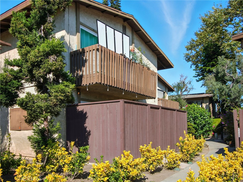 Welcome to this Prime First Floor End Unit Location that's spacious with 2 bedrooms, 1 1/4 bathrooms with ideal privacy. This is an easily accessible Condo offering and 943 sq ft of comfortable living space on a 1,000 sq ft lot. Conveniently located approximately 1.5 miles from South Coast Plaza! This move-in ready home features custom cabinetry in the kitchen and bathrooms, quartz countertops, and a convenient breakfast bar. The kitchen includes all appliances—refrigerator, gas stove, microwave, and dishwasher—making it ideal for both everyday living and entertaining. The open-concept kitchen and living room create a welcoming space that’s perfect for hosting guests or enjoying peaceful evenings at home.
Updated wood-like porcelain Hollywood tile flooring runs throughout the unit, offering durability and style. LED lighting fixtures, ceiling fans, and updated bathroom lighting add a modern touch. Double-pane windows in both bedrooms and a lightly tinted double-pane patio door creates energy efficiency reducing external noise and heat, creating a tranquil indoor environment. Step outside to a private patio enhanced with boxwood paneling, perfect for outdoor entertaining or relaxing in privacy. All interior outlets and light switches have been replaced, adding to the home's fresh and updated feel.
This gated community offers a wide range of amenities including a pool, jacuzzi, clubhouse, gym, and BBQ area with tables. The HOA covers gas, water, trash, and grounds maintenance for added convenience. Residents also enjoy access to two coin-operated community laundromats. Parking includes one dedicated carport space with extra built-in storage, plus one non-reserved spot available on a daily first-come, first-serve basis. Guest parking is available during the day, with overnight passes upon request.
Located conveniently within walking distance to Carl Thornton Park, residents can enjoy walking and jogging trails, exercise stations, basketball courts, fishing, and two large playgrounds. This condo offers a perfect blend of comfort, location, and lifestyle—ideal for those seeking a stylish home near top shopping and dining. Opportunities like this don’t last—come see why this condo stands out and make it yours before it’s gone!
