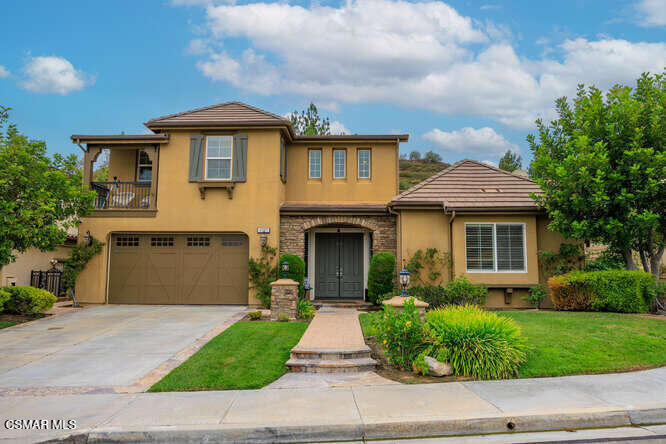 This spectacular home, nestled in the desirable Windstone neighborhood within the BIG SKY community of Simi Valley, is currently offering an incredible promotion--half off your first month's rent. This beautiful two-story residence features nearly 4,000 square feet of living space with a bright, open floor plan. A stunning pendant chandelier welcomes you in the foyer, setting the tone for the elegant details throughout.The home offers four bedrooms plus an office and four and a half bathrooms, including a convenient main-floor bedroom with its own private bath--ideal for guests or multi-generational living. The spacious primary suite upstairs has been thoughtfully converted to include an additional room, perfect for a game room or retreat, while the other bedrooms each have access to their own bathrooms for comfort and privacy.The gourmet kitchen is appointed with generous cabinet and counter space, a center island, and a built-in refrigerator, and it flows seamlessly into the family room. A two-way fireplace adds warmth and character to both formal living rooms, while built-in speakers in the family room, dining room, living room, and even possible the backyard elevate the entertainment experience. A formal dining area and an upstairs loft provide added versatility to the layout.The third-car garage has been converted into a multipurpose room, while the remaining two-car garage offers ample parking and storage. Outdoors, the private backyard features a large patio with furniture, an outdoor fireplace, a BBQ setup, and a generous grassy area--ideal for relaxing or hosting gatherings.Additional highlights include a downstairs laundry room, dual air-conditioning units for upstairs and downstairs, a fully automated smart-home system with keyless entry, security cameras, Ring doorbell cameras, ceiling-mounted sprinkler systems, recessed lighting, and central heating and air. With easy access to Sunset Point, local parks,, and shopping, this home combines modern upgrades, comfort, and convenience in one exceptional rental.