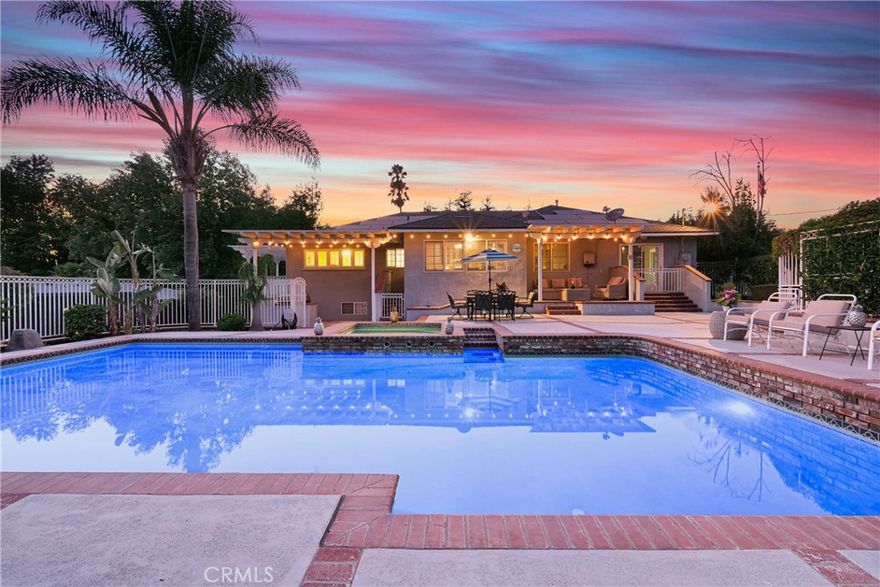 Discover the pinnacle of tranquil California living at this remarkable Friendly Hills estate, where classic elegance meets modern comfort. Nestled on a quiet corner lot, this property is a private sanctuary offering a legacy of quality and peace of mind in one of Whittier's most sought-after neighborhoods.



Step inside to an interior of thoughtful design and luxury. Gleaming hardwood floors flow through formal and informal living and dining areas, perfect for both grand entertaining and casual relaxation. Find a quiet moment in the sophisticated library with its inviting fireplace. The gourmet kitchen is a culinary masterpiece, featuring premium Viking appliances, expansive granite countertops, a large center island, and double ovens. Grand windows and glass doors bathe the home in an abundance of natural light.



The home's accommodations are highlighted by an expansive dual room master suite featuring its own private deck. This luxurious space consists of the main master bedroom, which includes its own retreat and a large walk-in closet, and a magnificent custom bathroom that serves as a personal spa, complete with a classic clawfoot tub, a separate shower, and elegant stone floors. The lower level adds to the home's versatility, featuring a desirable private guest suite with its own separate entry and kitchenette, as well as a large entertainment room perfect for gatherings and recreation.



The exterior is an absolute oasis, your own private paradise. The meticulously manicured grounds create a tranquil, park-like setting offering serene privacy. The backyard is an entertainer's resort, centered around a large, heated swimming pool and separate Jacuzzi. Host memorable gatherings in the private BBQ area or find tranquility under the charming, lighted gazebo. As evening falls, gather on the stunning observation deck.



Perfectly situated, this home offers a rare combination of secluded tranquility and exceptional convenience. You're just moments from the shopping and dining at The Whittwood Town Center, the recreational offerings of the Friendly Hills Country Club, and the natural splendor of Turnbull Canyon's hiking trails. Daily living is effortless with premier supermarkets like Trader Joe's and Ralphs nearby, along with the celebrated restaurants of historic Uptown Whittier, all while being tucked away from the noise of main thoroughfares.
