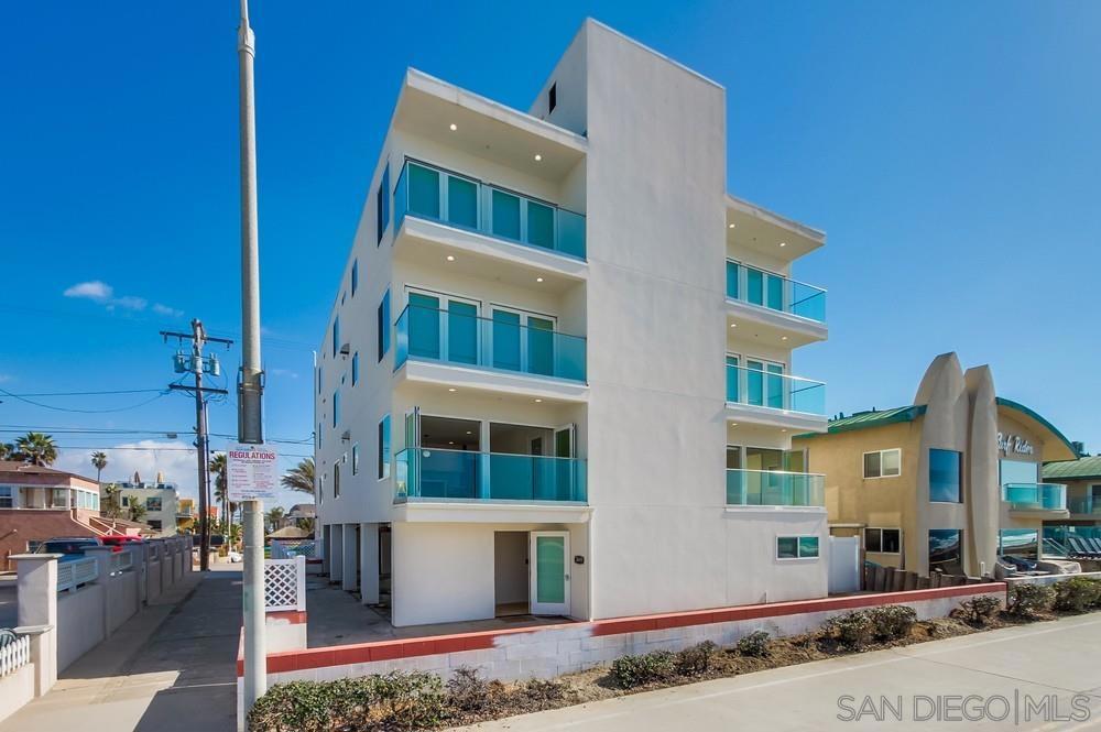 RARE TROPHY ASSET—the only 6-unit, 4-story oceanfront building in Mission Beach with no HOA and white papers in hand for a condo map. Six identical 2 BR / 2 BA ~1,100 SF residences span an irreplaceable 30 FT-wide lot, crowned by the ONLY 2 true 4th-floor penthouses in MB—soaring above the 30-ft height cap for panoramic surf-to-skyline views AND the bay! From studs out, the property underwent a $2 M+ fully permitted rebuild (2023): new roof, plumbing, electrical, HVAC, structural beams and framing, impact windows, glass sliding doors, smooth stucco, designer kitchens, spa baths, Euro-oak floors, and glass balcony railings that vanish into the horizon. Garage yields 8 on-site parking spaces (All single no tandem) plus shared oceanfront patio directly on the boardwalk AND each unit has its own oceanfront balcony + back balcony facing the bay. Operational flexibility & upside: • Vacation-rent all 4 upper units for maximum cash flow—pro formas exceed $760 K GSI. • Maintain existing two long-term leases in 2nd-floor units to preserve Tier-2 STR permits, while operating the top four as premium short-term rentals. • Sell-off strategy: activate the condo map and disposition units individually in a high-velocity market hungry for turnkey new build oceanfront condos. No HOA dues, no deferred maintenance, and no comparable site left to build. Whether held as a legacy multi-family asset, operated as a boutique luxury rental stack, or condo sales for immediate profits, 3449 Ocean Front Walk offers a once-in-a-generation chance to control the trophy of Mission Beach.