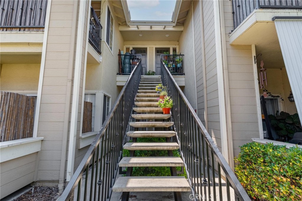 **PREMIUM LOCATION**RISE ABOVE IT ALL**PRIVATE/ELEVATED LEVEL HOME**NO FOOT TRAFFIC/NO PEOPLE WALKING BY**EXCELLENT LOCATION in Village Walk! EXCEPTIONALLY SITUATED, courtyard facing. Owner-Occupied since 2006 means well cared-for and perfectly maintained! Commuter! First time buyer! THIS IS THE ONE! Courtyard (not parking lot) facing deck is PRIVATE with a flush VIEW of high TREE-tops filtering in natural light! High ceilings give an airy and roomy feel, clean as a whistle. Kitchen with GRANITE counter tops, STAINLESS appliances, and rich cabinetry bring a real LUXURY to this home. Granite stone counter in bathroom, roomy primary bedroom with bay-window which also looks out at lush tree tops. GATED COMMUNITY and ownership gives you exclusive PRIVATE ACCESS to the community POOL, SPA, GYM, and CLUBHOUSE. Have a dog? Great! Private dog park within this gated community too, with benches and baggie stations, and a deluxe PLAYGROUND area with play structure!!