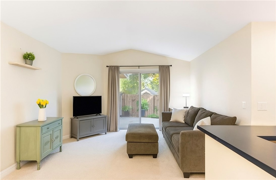 Located in the heart of Village Walk Community, this second-level San Diego condo offers a rare blend of privacy, comfort, and elevated views. Positioned on the top floor, enjoy lush tree-lined views overlooking the courtyard, creating a peaceful and private atmosphere. Inside, the open layout features high ceilings and abundant natural light, giving the space an airy, inviting feel. The kitchen includes granite countertops, stainless steel appliances, and rich wood cabinetry, while the primary bedroom offers a cozy bay window framed by greenery and a granite bathroom vanity. Owner-occupied since 2006, the home has been well cared for and is truly move-in ready. Community amenities include a pool, spa, gym, clubhouse, dog park, and playground, all within a secure gated setting close to shopping, dining, and major commuter routes. Some photos have been virtually decluttered and/or staged to highlight the home’s potential and inspire buyer creativity.