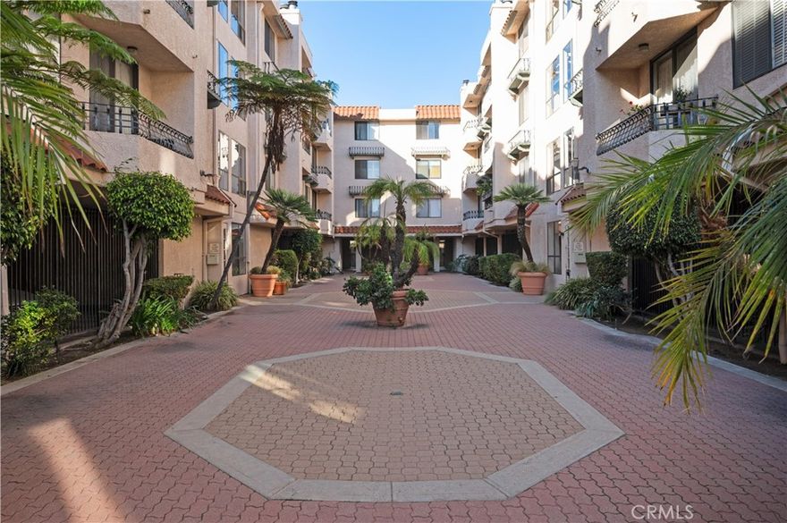 Welcome to Casa Verde Estates!  This bright one-bedroom/one-bathroom corner unit condominium offers city and community views framed by mature trees.  The home features new luxury plank flooring, brand-new appliances, a built-in wine refrigerator, and fresh paint throughout.  Enjoy a cozy fireplace, a private balcony with lovely views, and a convenient in-kitchen laundry room with additional storage.  The unit includes two parking spaces and is ideally located near shops, restaurants, parks and provides quick access to the freeway.