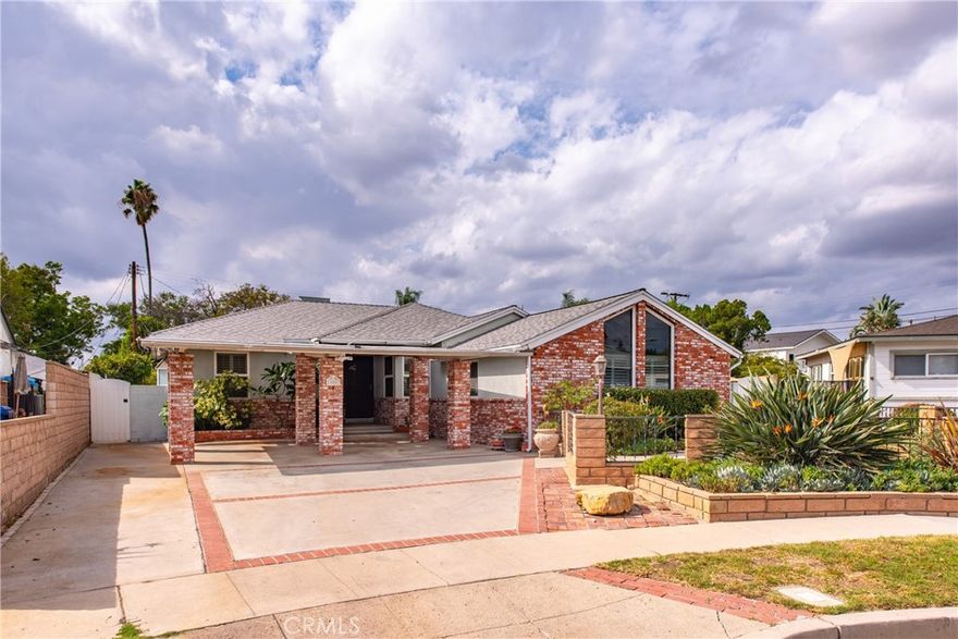 Charming 3-bedroom, 2-bath ranch-style pool home with great bones and plenty of potential. Boasting over 1,600 square feet of comfortable living space on a spacious nearly 9,000-square-foot lot, this residence is nestled in a quiet cul-de-sac within a desirable Granada Hills neighborhood. The home exudes warmth and character, ready for your personal touch. Step inside to find an inviting family room and a separate dining area, complemented by beautiful hardwood flooring throughout and newer vinyl windows that enhance energy efficiency. The well-maintained galley-style kitchen features a breakfast nook with lovely views of the sparkling pool and landscaped backyard—perfect for entertaining or relaxing. Two generously sized bedrooms, including a third oversized bedroom with a step-down entry, dual custom closets, and soaring ceilings, provide versatile living options. While the home is move-in ready, it offers a fantastic canvas for upgrades and expansions, allowing you to customize and create your dream space. This wonderful property combines solid construction with exciting possibilities — a perfect foundation for your future enhancements.
