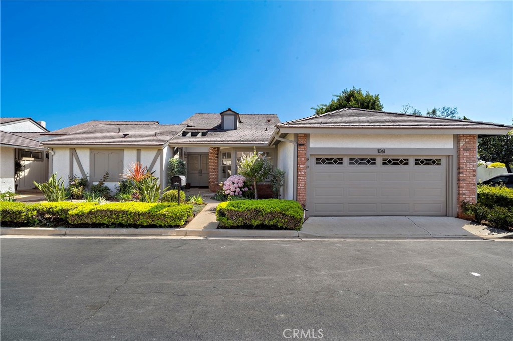 Welcome to 1061 Regis, a beautifully remodeled single story home located in the peaceful and centrally located community of The Colony in Tustin. Single stories are difficult to find, especially in a location so centralized as this home. Take advantage of all Tustin has to offer; parks, parades, restaurants, entertainment, and fantastic schools, to name a few. This home is an entertainer's dream, with space inside and out to host family, friends, and neighbors. Inside, all are immediately taken with the high vaulted ceilings, exposed beams creating visual elements of grandeur, and natural illumination throughout, a sweet sentiment brought in by natural light and warmth to create a positive energy and aura of spaciousness larger than what the square footage would suggest. The rooms are refreshed and well situated, with two beyond the atrium, while the primary bedroom sits up front. The vaulted ceilings in the primary bedroom, along with spacious walk-in closet and primary bathroom with dual vanities, step in shower, and separate soaker tub complete the owner centric design of elevated living. Enjoy peaceful evenings by the fireplace, a multi-course dinner in the splendid dining room, or create the perfect meal in the light and bright kitchen updated with refreshed cabinets, contrasting countertops, and newly updated and upgraded stainless steel appliances. Don't want to cook? Maybe enjoy a treat or a coffee is all in the south facing breakfast nook. Outside, this home has the largest lot in the entire community by tremendous margin. A blank canvas, dotted throughout with mature trees and vegetation, has myriad opportunities to create the most ideal outdoor living and outdoor loving spaces, comfortable enough for an intimate evening, or vast enough to entertain the entire community of the Colony for an evening of fun and friendship. Become the second owner of this beautiful property. Come see today, and enjoy what makes this home special.