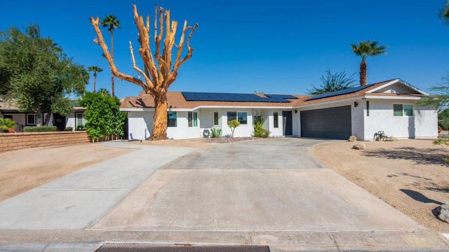 Welcome to this impeccably maintained 3-bedroom, 2-bath single-family home offering 1,531 sq ft of stylish living space on a generous 6,098 sq ft lot. Built in 1984, this thoughtfully upgraded residence features a newer roof, a recently installed HVAC system, and fully paid-off solar panels paired with two Tesla Powerwall batteries--delivering energy efficiency, backup power, and long-term savings.Step inside to discover a bright, open floor plan with a remodeled kitchen showcasing sleek quartz countertops, a cozy breakfast nook, and a seamless kitchen/dining combo--perfect for everyday living and entertaining. The home is finished with double-pane windows, a mix of ceramic tile and plush carpet flooring, and a spacious 2-car garage.Enjoy the privacy of a fully fenced backyard, ideal for hosting guests or soaking up the desert sun in peace. Located in a quiet neighborhood, you're just minutes from top-rated schools and premier attractions including El Paseo Shopping District, The Living Desert Zoo & Gardens, Indian Wells Tennis Garden, and world-class golf courses.Whether you're seeking a primary residence, a vacation escape, or a smart investment, this Palm Desert gem checks all the boxes.