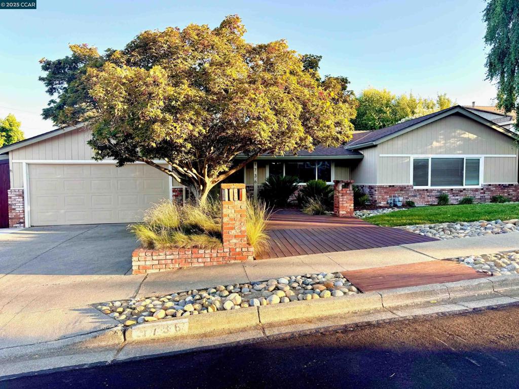 Open House Saturday, 7/26, 2-4PM, & Sunday, 7/27, 1-4PM. Located on a serene, tree-lined street, this beautifully updated 3-bedroom, 2-bathroom home offers the perfect blend of style, comfort, and functionality. Enjoy rich wood flooring, dual-pane windows, and a seamless indoor-outdoor flow ideal for entertaining. The spacious living area features a striking double-sided fireplace, connecting the main living room to the dining area and creating a warm, inviting atmosphere. The gourmet kitchen is a chef’s dream, complete with granite countertops, stainless steel appliances, microwave, dishwasher, and elegant finishes throughout. A custom-built bar setup includes a Perlick commercial-grade refrigerator, extreme icemaker, and tailored cabinetry—perfect for hosting guests. Step outside to your private backyard oasis, where summer fun awaits. Cool off in the sparkling pool with a basketball hoop, gas pool heater, and solar heating. The outdoor kitchen is a showstopper, featuring a built-in BBQ, refrigerator, sink, and IPE decking. Relax on the covered porch or entertain beneath the stars. Just minutes from scenic trails and the beloved Hidden Lakes Park.