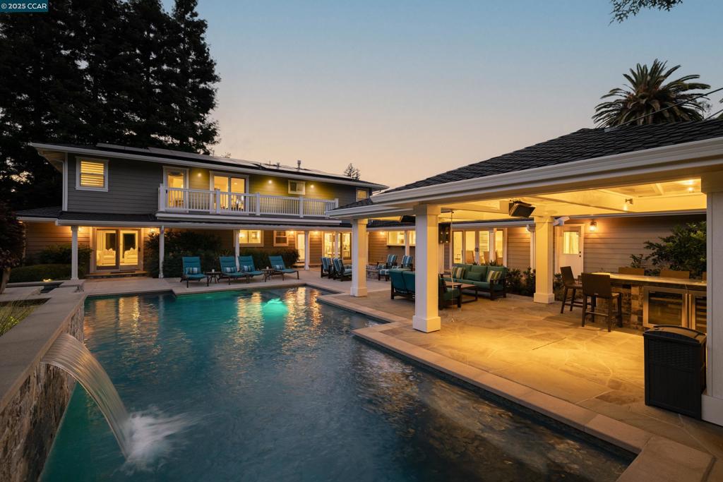 Just a block from downtown Danville and the Iron Horse Trail, this stunning 5-bedroom, 4-bathroom (2 half baths) home provides a sophisticated retreat in one of the most charming towns in the Bay Area! The home features a remodeled and open chef’s kitchen with premium stainless steel appliances, including a Wolf range, all opening into a spacious great room with a gas fireplace. There's two bedrooms on the main level (including primary) plus a separate office and 3 bedrooms upstairs (including an additional ensuite bedroom). Enjoy the formal but open living and dining spaces that flow effortlessly into the ultimate indoor-outdoor lifestyle. Step into your super private backyard oasis complete with a sparkling pool, hot tub, built-in BBQ, outdoor living room with dual TVs, and built-in heaters—ideal for year-round enjoyment. Napa meets the Bay Area at 125 El Dorado in Danville! What isn't to love?