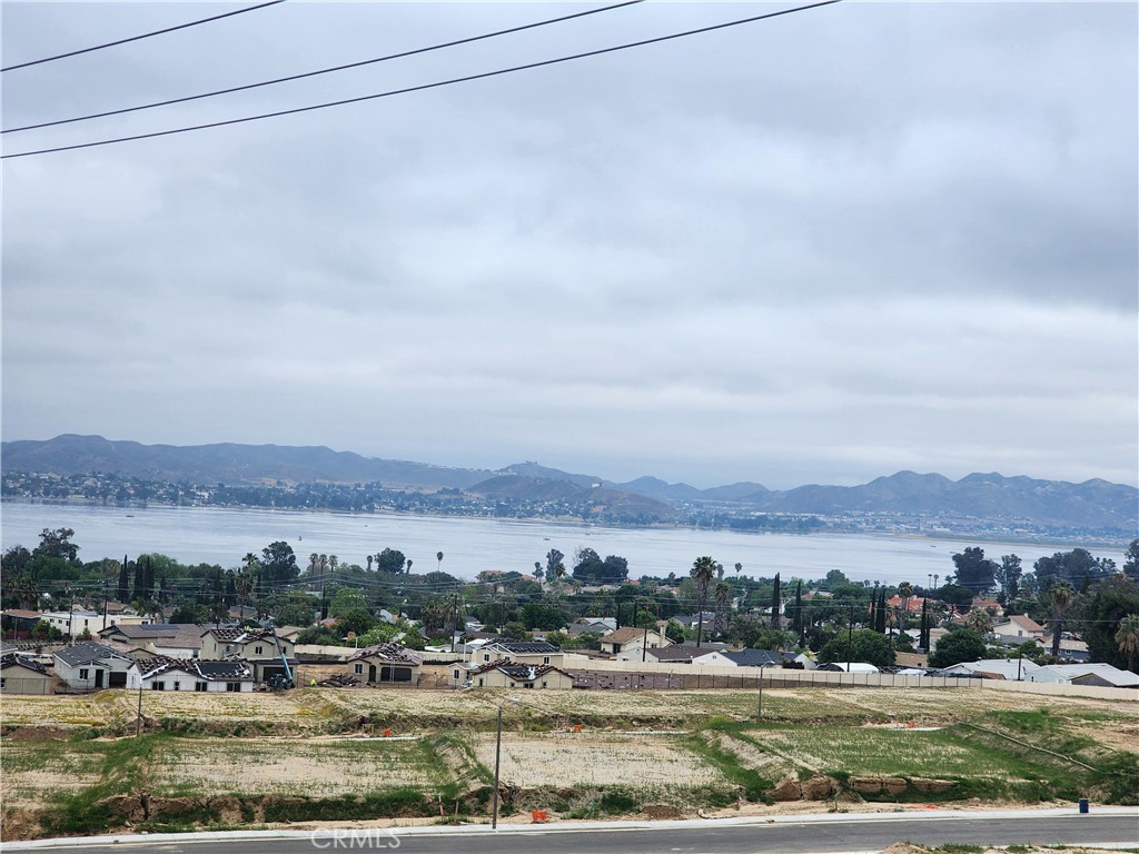 Incredible unobstructed views of the lake and valley. Very private and serene location, no neighbors behind you. Rough house pad and driveway have been installed. Water meter has been installed. Perk test was completed. Come walk this property and experience the views for yourself-- pictures do not do this location justice. Property located near the corner of Riverside Dr. and Laguna- continue on dirt road for short distance to the newly paved driveway. Property can be accessed from Riverside Dr and Bowmore Ave.