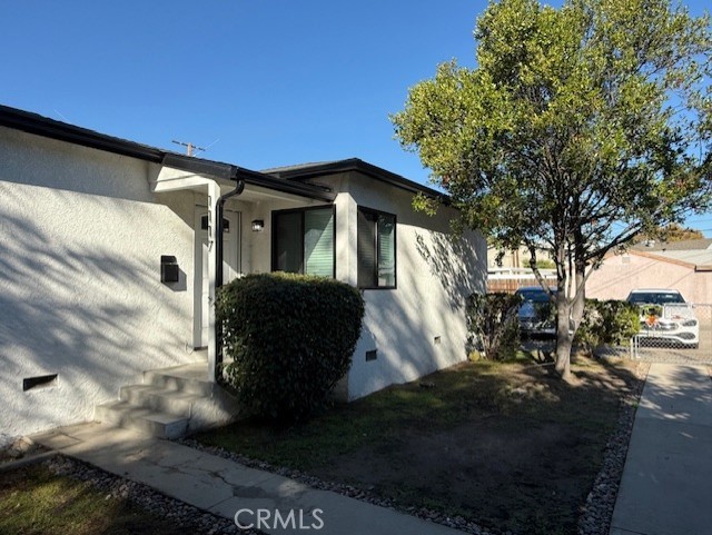 Completely redone unit.  2 bedrooms, 1 bath with Central AC and washer / dryer hookups inside unit.  This is part of a duplex.  Water & power are included in the rent.  Fenced yard.  Back unit.