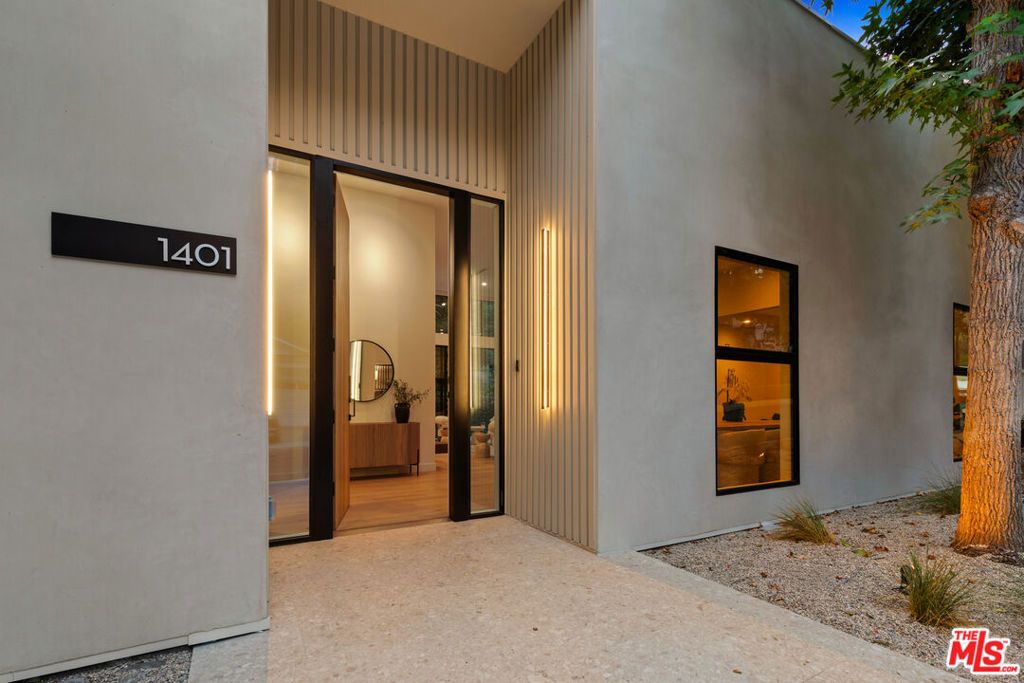 Photo of 1401 N Bundy Drive, Los Angeles, CA 90049 (MLS # 25602779)