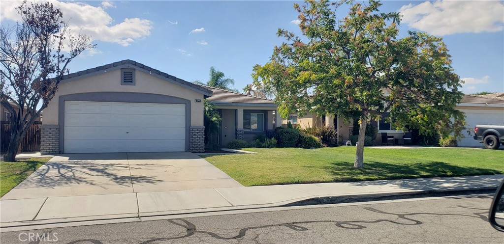 Beautiful Menifee Single Story on cul-de-sac. First time on the market updated and well maintained with low HOA, low taxes, and desirable cul-de-sac location! Freshly painted interior, newer carpet, newer appliances. Hard surface flooring through-out main living areas and carpet in bedrooms. Entry opens to a formal living/dining room, kitchen with plenty of storage including large reach-in pantry adjacent to cozy family room. Spacious primary suite has ample closet space and double vanity, tile walk-in shower. Laundry room is conveniently located just outside primary bedroom. Easy to maintain back yard with large patio. Garage has 220 installed for your EV. Walking distance to School and shopping/dining areas.