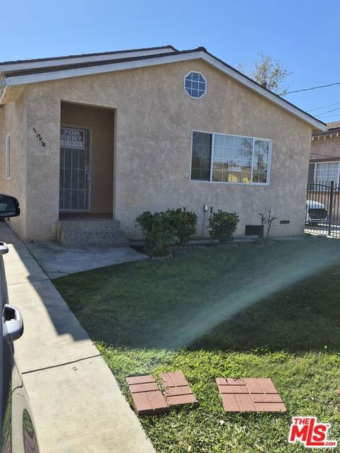 Photo of 124 W 104th Street, Los Angeles, CA 90003 (MLS # 26641639)