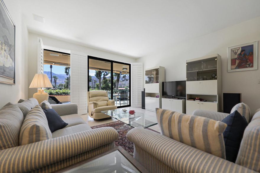 Experience the best of desert living in this beautifully updated 2-bedroom, 2-bath condo, ideally situated just moments from the prestigious country club. Perched in a prime location, this residence offers sweeping southern views of the Santa Rosa Mountains--an ever-changing canvas of light and shadow that transforms every sunset into a private show.Inside, the open-concept layout is designed for effortless flow and natural light. The living and dining areas feature floor-to-ceiling glass that frames the view, while the kitchen boasts sleek granite countertops, white appliances, and ample storage for both casual and gourmet cooking.The spacious primary suite includes direct access to the view patio, perfect for morning coffee or evening wine. For an added touch of relaxation, step into a soothing and serene sauna.  A second bedroom offers flexibility for guests or a home office.Community amenities include sparkling pools and spas, and lush landscaping--all just steps from world-class golf, dining, and social events at the nearby country club.Whether you're seeking a full-time residence or a seasonal escape, this condo delivers location, lifestyle, and luxury in one perfect package.