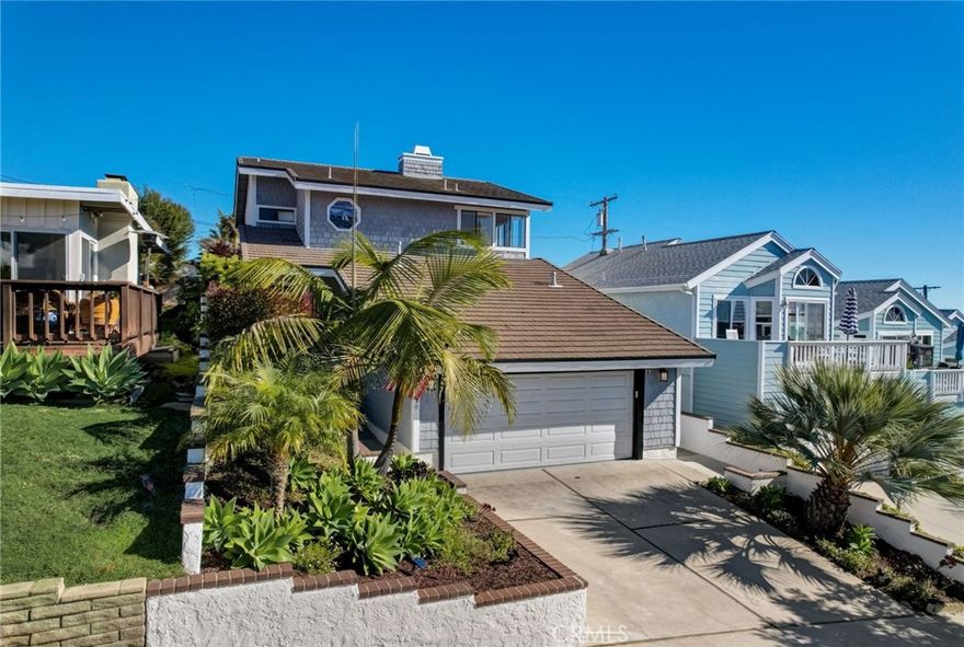 Just like brand new! New KitchenAid appliances with washer/dryer included, new carpet, new paint & more... LANTERN VILLAGE GEM WITH PANORAMIC OCEAN VIEWS 3 Bedroom, 2.5 Bath | Large 2-Car Garage | Lower Level Suite Discover your new home in the picturesque Lantern Village, where coastal living meets elegance. This stunning multi-level home is poised to be your coastal sanctuary, offering a perfect blend of space, style, and breathtaking ocean views. This charming cape cod style home has it's own ground level private private bedroom with a full bath and sizable walk in closet. On the entry level are the master bedroom with adjoining full bathroom and private patio just out the sliding doors. The 3rd bedroom also has private patio access as well as wall to wall closets with built in shelving. This home has plenty of space including a huge two car garage with new finished epoxy floor. This residence boasts brand new appliances, new carpet, plantain blinds, recessed lighting throughout, and a captivating fireplace, creating the perfect blend of comfort and style. The main living space balcony provides an ideal spot to relax and enjoy the panoramic ocean views. Ideally located in Dana Point's famous Lantern Village, this home is a short walk to a variety of shops, restaurants and the Del Prado Promenade. In addition, Just a stone's throw away from the renowned Dana Point Harbor and Ocean Institute, you'll have access to shops, restaurants, and the vibrant coastal lifestyle. Dana Point is known for it's quiet, family oriented community and we cannot forget the local events through out the year. Embrace the coastal lifestyle in this gorgeous Lantern Village home. Your beach home awaits!