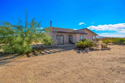 Photo of 79017 El Paseo Drive, 29 Palms, CA 92277 (MLS # JT26210130)