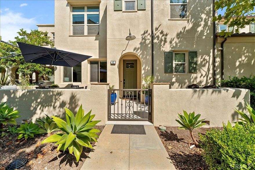 Immaculate 3 bedroom, 3 full bathroom, 2 story townhome. Large 2 car garage. One bedroom and one bathroom on the main level. Located in the award winning community of Rancho Mission Viejo. Situated in the Lyon Villas HOA of Sendero. Largest outdoor space for this model. Open front patio for entertaining. Covered side patio with ceiling fan adjacent to downstairs bedroom. Master bedroom has soaring lofted ceilings adding 7 extra windows. Very light and bright. Meticulously maintained and upgraded by the original owners. Many custom features including: Engineered European oak wood floor with mat finish downstairs (Republic Flooring Laurent Oaks). Waterproof/pet friendly US made Passages by Tigressa Quest carpet with memory foam smart cushion padding upstairs. Custom quartzite Perla Elegante countertops and backsplash in kitchen. Custom 10 foot island with room to seat 6. Kohler Purist professional kitchen faucet. Kohler Strive smart divide large & medium double bowl stainless steel sink. 2 year old whole-house fan. 1 year old HVAC (smart home enabled). 13 new windows. Custom Stoneside window treatments. Pietra Italia white outdoor rated flooring in outdoor spaces. Custom ash kitchen cabinets with 2 spice rack pullouts. 6 large drawers for pots and pans. European designed cloud corner storage. No wasted cabinet space. 2 pantries. Baking tray storage. Minka Aire (luxury brand) fans in every room. RH lighting in bathrooms. Custom built-in closet in master bedroom. Custom bookcase in hall. Built-in shoe rack/shelving in laundry room. Built-in storage in garage. Built-in workshop in garage. Custom shower door in master bath. Custom barn-style door at master bath entry. Built-in quartered oak veneer floating dresser and shelves in master bedroom. Dimmable LED can lights throughout. Dimmable under kitchen cabinet lighting. Top of the line appliances include Miele (high-end luxury brand) dishwasher with salt reservoir. Dacor gas range with air fryer. Dacor microwave. Prime location close to walking trails. Just steps away from a resort-style pool complete with cabanas, a jacuzzi, and a staffed bar during summer months. Incredible community amenities. Top-rated K-8 school, community farms, state-of-the-art fitness centers, a putting green, bocce ball courts, tennis and pickle ball courts, playgrounds, a charming coffee shop, cozy fire pits and an exciting arcade.