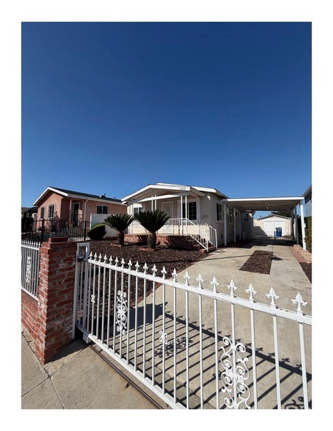 Photo of 329 W 120th ST, Los Angeles, CA 90061 (MLS # DW26226674)