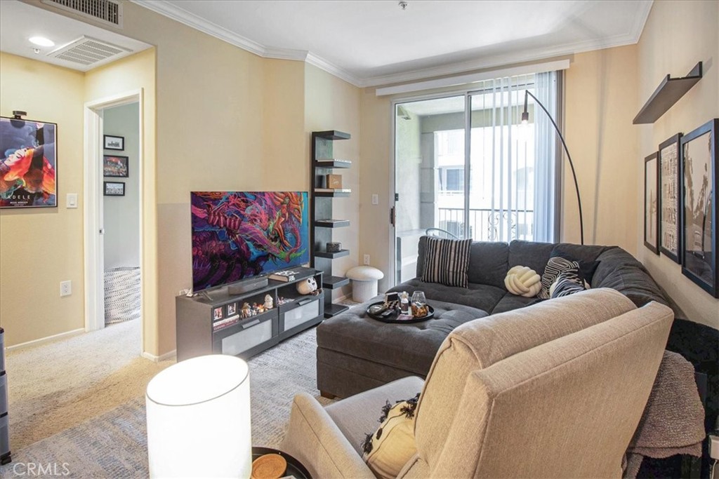 Beautiful Astor Court model located on the 3rd floor with the tree lined walkway view! This one bedroom one bathroom home includes Nest technology, granite counter tops, stainless steel appliances in the kitchen and crown molding. Enjoy soothing breeze from the private patio! The sophisticated living of the Watermarke community offers bounty of amenities including concierge services, business and fitness centers, movie theater and billiards rooms, 3 pools, 4 spas, and an indoor basketball and tennis courts. Gated parking structure. Refrigerator and stackable washer and dryer in kitchen are included in the sale. Come see this cozy condo and make Watermarke your home!