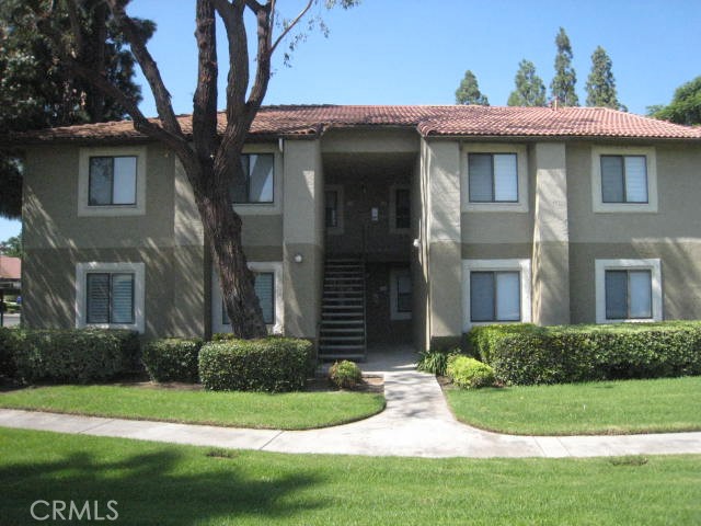 Beautiful well maintained gated La Serena Community with pool & spa, sauna, club house! Newer flooring and paint throughout. Bright and airy downstairs unit with 2 spacious bedrooms overlooking green lawn (no building on the opposite side), an updated bathroom. A spacious living/family room, breakfast nook next to patio sliding glass door, and the kitchen is updated as well! Large patio for BBQ & afternoon sunset. Two parking spaces are next to each other, located next to the Unit building, and one is covered. Conveniently located ~ shopping, dining, schools and freeways.