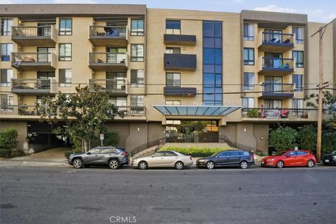 Photo of 7320 Hawthorn Boulevard #108, Los Angeles, CA 90046 (MLS # CV26042752)