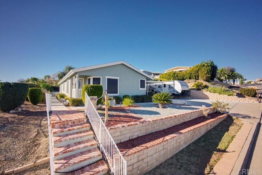 Experience comfort, convenience, and room to breathe in this well-kept 3 bedroom, 2 bath home set on an impressive 1/3-acre lot within a desirable 55+ community. Residents enjoy access to resort-style amenities including a refreshing pool, soothing spa, clubhouse, and meeting room — all with a low HOA! Step inside to an inviting layout enhanced by engineered hardwood flooring, natural light, and great flow throughout. The spacious master bedroom offers a peaceful retreat with plenty of room for oversized furniture. The kitchen is move-in ready and all appliances convey, making your transition seamless. A newer water heater adds extra value and peace of mind. Outside, you’ll love the flexibility of a 2-car garage plus RV parking — a rare find! With 1/3 acre lot, there is ample opportunity for outdoor living, gardening, or additional storage while still maintaining privacy.