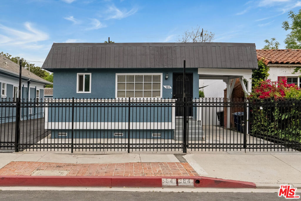 This charming two-bedroom, two-bathroom home is situated in Weho West, a highly desirable neighborhood in West Hollywood. The home boasts sun-filled rooms, dimmable LED lighting, ample closet space, an oversized primary suite with a wet bar including a mini fridge and wine cooler, a well-appointed kitchen featuring stainless steel appliances, including a stackable washer/dryer, and bar top seating. Two bathrooms, one of which includes a steam shower. The property is gated and secure, with two car parking spaces included. Outdoor spaces include a sitting porch located off the primary suite, and private outdoor space accessible via the secondary bedroom and exterior access points.