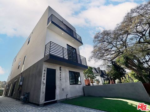 Photo of 8664 Cadillac Avenue, Los Angeles, CA 90034 (MLS # 25583643)