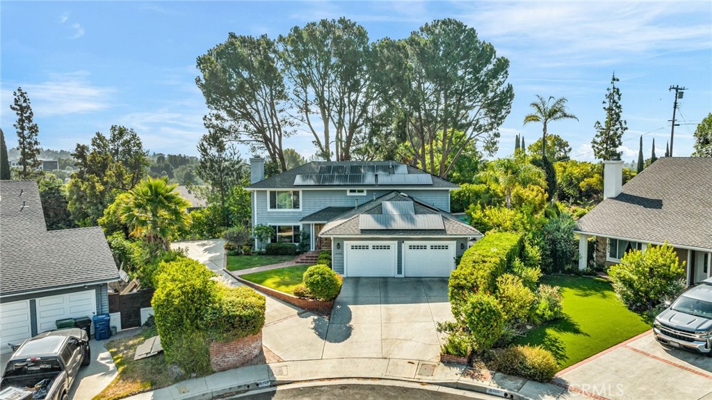 Welcome to this beautifully remodeled two-level home with stunning views, located in a desirable West Hills cul-de-sac. Designed with contemporary style and an open floor plan, this residence is perfect for both entertaining and everyday living.
The spacious living room features a cozy fireplace and flows seamlessly into the dining area and a custom-designed kitchen, complete with top-of-the-line appliances, stylish cabinetry, premium fixtures, and elegant countertops.
Abundant windows throughout the home fill the interior with natural light, highlighting modern LED recessed lighting and attractive laminate flooring. The thoughtfully designed private outdoor space includes a large patio and built-in BBQ—ideal for gatherings.
Step outside to enjoy a sparkling pool and relaxing Jacuzzi, surrounded by tranquil landscaping and set against the backdrop of breathtaking views. Upstairs, the master suite features its own fireplace, a luxurious bathroom, walk-in closet, and direct access to an elevated open deck—also accessible from an additional bedroom—offering the perfect place to unwind and take in the scenery.
A rare highlight is the extra-long private driveway—ideal for an RV, trailer, boat, or multiple guest vehicles. The home also features solar panels for energy efficiency and lower utility costs. Don’t miss your chance to own a West Hills home with a view—schedule your showing today!