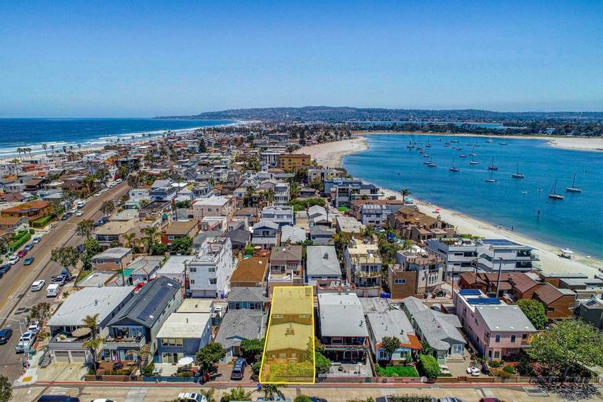 Exceptional two unit opportunity in one of the most desirable pockets of South Mission Beach. Set on a quiet street just a few homes from Mission Bay and 2 blocks from the majestic Pacific, this property offers a rare combination of versatility and potential. The existing 1,694 sf duplex includes a 3-bed, 2-bath main residence with an attached 2-car garage, plus an attached 1-bedroom, 1-bath upper unit with its own entrance, deck, and additional off-street parking space. The upper unit is currently open to the main residence but can be easily closed for separate occupants. The 2,400 sf lot is zoned R-2, allowing two units per parcel and providing options to renovate or redevelop to optimize value as either a duplex or larger single family residence. Current zoning may support new construction totaling over 2,600sf of combined living area. In 2018, plans were commissioned to construct a stunning 3 story duplex with rooftop view deck. Now expired but potential to reopen. Located near the tranquil bayside of the peninsula and within easy walking distance of the beach, parks, and local amenities, this property sits in one of Mission Beach’s most coveted and quiet enclaves. For developers or end users alike, the offering represents a rare chance to secure a legacy-level holding—particularly given the adjacent property (814-816 San Luis Rey) is also available, enabling a combined project of extraordinary scale and potential. First time on the market in over 50 years - do not miss this opportunity to make your own mark in this cherished beach community.