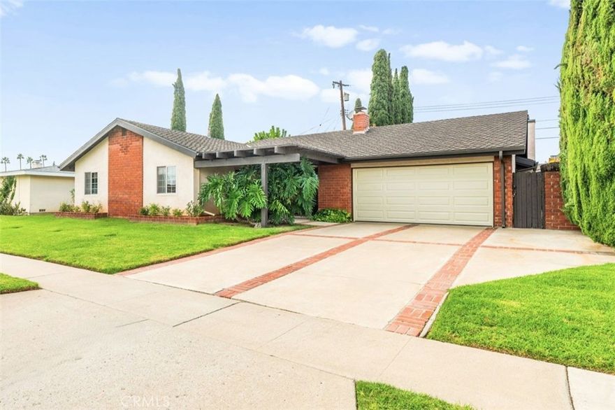 Very rare one-owner, first time listed North Tustin single story home exuding pride of ownership. This charming family home located in the desirable North Tustin neighborhood of Santa Ana has been meticulously maintained and cared for. Featuring 3 bedrooms, 2 full bathrooms, increased living space via a 20x20 vaulted living room, dual fireplaces, an inground 15x15 spa/pool, and built-in covered bbq area. The large remodeled kitchen features a large central island, granite counters, matching Kitchenaid stainless appliances, and hardwood cabinets. The primary bedroom is spacious with a connected primary bathroom complete with walk-in shower and dual sink vanity. Flooring throughout the home is a comfortable blend of real hardwood, tile and carpet in the guest bedrooms. The exterior of the home features a newer, premium grade shingle roof and upgraded vinyl windows throughout, and a very private backyard with a peaceful design yet open for entertaining. This well-maintained home is located in an outstanding neighborhood, near incredible schools with a wide variety of shopping and dining options within blocks. This is a rare and amazing home within a fantastic surrounding community.