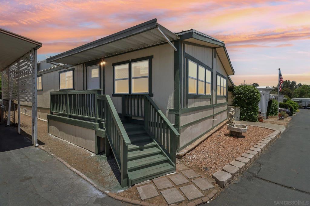 Prepare to be amazed, this property is absolutely gorgeous! A bright and airy like new remodeled manufactured home, taken down to the sticks in desirable Valley Center. This stunner resides in the quaint Hide Away Lake Mobile Estates 55+ Community and could be yours for only $275,000. 2 bedrooms, 2 full baths, 1344 esf has been exquisitely and completely renovated, with the lowest space rent in the area. Improvements include, but are not limited to: New 50 year roof, new water lines, new drywall, new flooring throughout, completely renovated bathrooms, ensuite features his/hers sinks, wheelchair accessible doorways in every room and dual shower heads along with a spacious walk in closet.The kitchen is a chef's delight with brand new LG appliances, tons of storage, plentiful counter space and gleaming center island with pendant lights just begging for the family to come visit and circle around. Closets and additional storage paired with the in-unit laundry and craft room/office ensures that all of your belongings will have a happy home for themselves and let the open floor plan shine. It is the pinnacle of energy efficiency with new windows, updated AC and a whole house fan to send the evening mountain breeze front to back. The park is well maintained, gated and has the sweetest sense of community. A few of the park's features include a lake, community pool, clubhouse with billiards and a library, gym, community laundry room, hiking trails, dog park and RV parking. The current space rent is only $827.00 a month to enjoy the serene wooded beauty that is Valley Center.