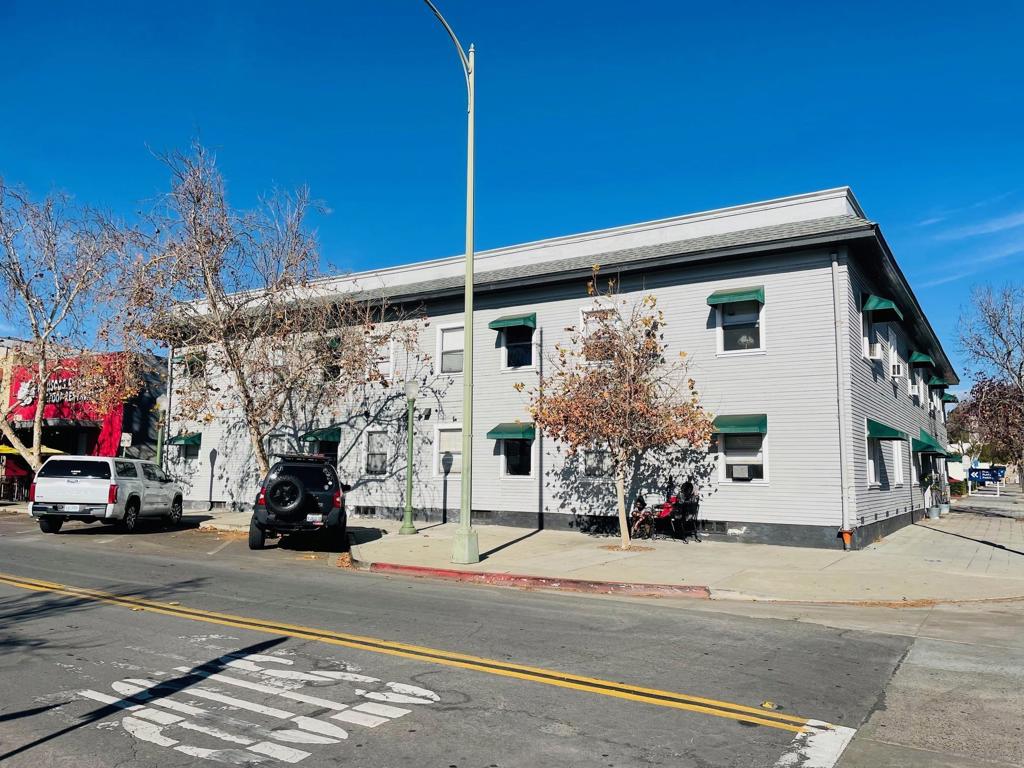 We are proud to introduce the Trentom Arms. This 29-unit multi-family property, built in 1925 and renovated in 2021, is located in the Escondido Downtown Specific Plan area, offering a unique blend of historic charm and modern comforts. The property features 17 one-bedroom/one-bath units, 1 two-bedroom/one-bath unit, and 11 studios. The building features a new roof, plumbing, and electrical systems, ensuring functionality and appeal. Units within the property are submetered for electricity. RUBs (Ratio Utility Billing System) have been implemented for electricity, gas, water, and sewer, promoting efficient utility management. With a strong 100% occupancy rate, this property not only stands as a testament to its desirability but also presents a value-add investment opportunity through potential rent increases. It's an ideal choice for investors looking for a property that combines historical significance with contemporary living standards.