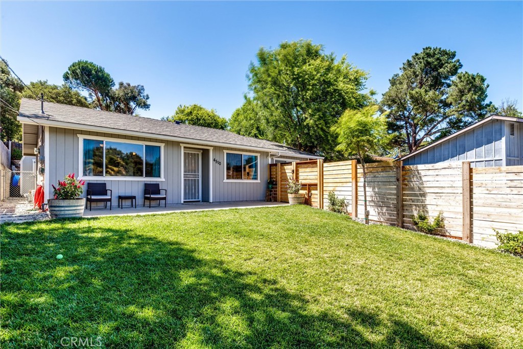 This charming and recently updated Atascadero home offers comfort, functionality, and curb appeal. With 2 bedrooms, 1 full bath, and 1,176 sqft of living space on a 5,980 sqft lot, it features brand-new vinyl plank flooring throughout and granite counters in the bathroom with a tub/shower combo. The bedrooms are privately situated down the hall, creating a nice separation from the main living areas. The cozy living room flows into a light-filled kitchen and dining area that overlooks the beautifully landscaped front yard. Stainless steel Frigidaire appliances, a reverse osmosis drinking water spout, and thoughtful kitchen touches make it both inviting and efficient.
A bonus flex room includes space for workouts, laundry, or hobbies—offering endless potential for a new owner. The front yard is fully fenced with fresh landscaping, a lush lawn, and an electronic code-lock gate for privacy and convenience. The terraced backyard includes raised garden beds, a newer 8x10 Tuff Shed, and dog-friendly side yards with cement walkways and hardscape stepping stones. Lengthy driveway allows for RV or boat parking. Move-in ready with all the charm of Central Coast living!