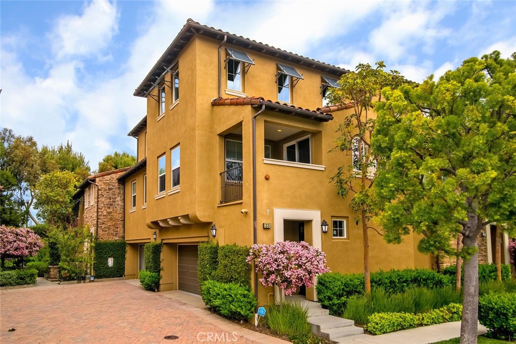 Location! Location! Light and Bright upgraded 3 Bedroom (one being used as an office- open to living room/kitchen) end unit in beautiful Turtle Ridge, Irvine! This fabulous carriage unit allows you to have 2 car garage below you and open concept living space above! Expansive high ceilings in the family room greet you as you enter the second floor living space which creates a feeling of a home not a condo! Newer luxury vinyl wood flooring throughout! An updated white kitchen with gorgeous black granite counters and stainless-steel appliances with modern newer refrigerator! Lots of windows on the main floor living area and offers a beautiful fireplace, large deck, recessed lighting throughout, washer and dryer room, and 2 bedrooms (one is open to living space and used as an office or hobby room) with an updated bathroom. The ensuite master is on a floor by itself and has updated bathroom with double sinks and separate shower and tub! Master has closets with upgraded built ins and mirrored doors. Linen cabinets are on both floors with a coat closet upon entering. Two car garage has epoxied floor and extra storage with direct access to the home. Newer Refrigerator and W/D and trash included. Association has pool, spa and barbeque for entertaining friends and family! Walking distance to local parks which has baseball fields, basketball courts, soccer fields, tennis courts and a community center too! 73 Toll Road and freeways are close by for commuting! On top of this, Newport, Corona del Mar beaches, restaurants, shopping and nightlife are all nearby too!
