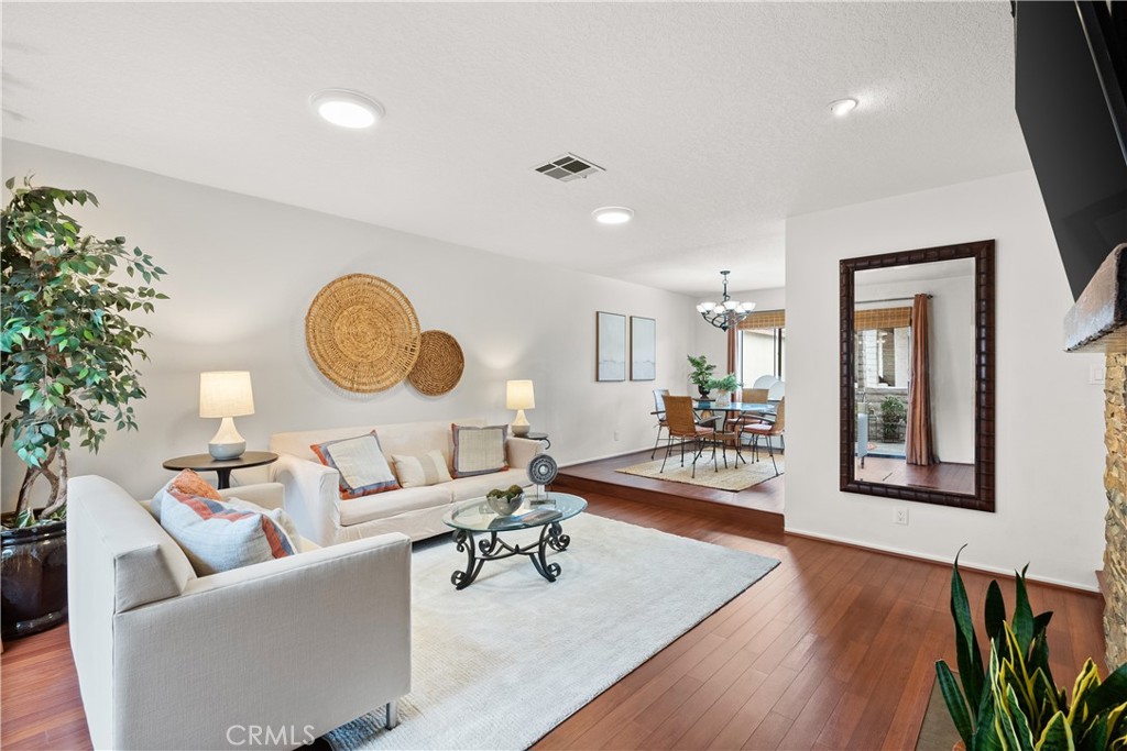 Tucked quietly away from the street just blocks from Redondo Beach, this updated townhome offers easy access to great local schools, Columbia Park and the beach lifestyle - without the beach-town premium! Inside, you’ll find a remodeled 3-bed + bonus room that’s brimming with style, space, and thoughtful upgrades throughout. The smart layout features an open-concept living and dining area where the stone fireplace sets the mood. Slide open the doors to a private tiled patio - it’s perfect for weekend lounging, outdoor dining or morning coffee. The kitchen impresses with crisp white cabinetry, granite countertops, a limestone stacked-stone mosaic backsplash, tile flooring, and like-new stainless appliances. You’ll love the three pantries, glass display cabinet, and bonus granite-topped storage. Upstairs, all three bedrooms feature vaulted ceilings and great light, including a spacious primary suite with its own private deck. The bathrooms have been tastefully remodeled. Laminate flooring flows throughout (no carpet!), and all sliding doors were replaced in 2023 by Renewal by Andersen - warranty included. Ceiling fans were added in the primary and guest bedroom for year-round comfort. The private 2-car garage offers direct access, laundry, built-in cabinets, a workbench, and overhead storage. Also downstairs is a versatile bonus room perfect for a home office, gym or storage. This boutique 10-unit complex is mostly owner-occupied with low HOA dues and a healthy $140K reserve fund, with future plans to repaint the entire exterior. There is upside to the value when this is done! Located near Edison Elementary, Magruder Middle School, North High, and Columbia Park, for convenience for every age and stage, plus quick access to the 405, beach, shopping, LAX and major employers like SpaceX and Northrup. It’s hard to find a 3 bedroom at this price point. Don’t miss this opportunity to get so much for your money!